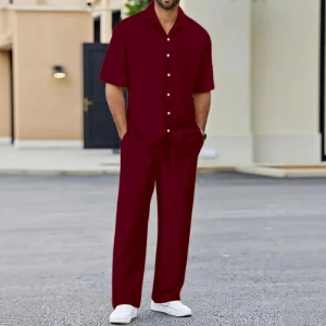 صورة طقم رجالي من قطعتين  قميص بأكمام قصيرة وأزرار أمامية، مناسب للشاطئ والصيف، بنطال فضفاض